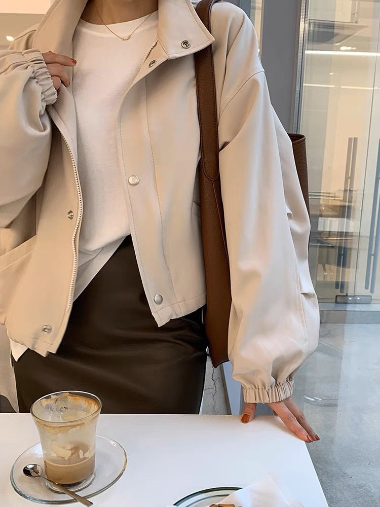 Solid Color Relaxed Fit Top With A Stand Up Collar